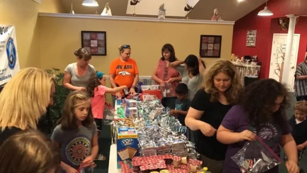 Volunteers packing supplies together